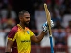 Nicholas Pooran celebrates his half century during the 2nd T20I between West Indies and India at Guyana National Stadium in Providence, Guyana(AFP)