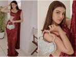 Kajal Aggarwal is an absolute stunner. The actress can pull off any look to perfection, be it a traditional saree or a casual dress. Her snippets from her recent photoshoot in a dazzling maroon saree are no exception. With her unmatchable charm, flawless make-up and incredible style, Kajal is making her followers drool and we can't take our eyes off her stunning pictures.(Instagram/@kajalaggarwalofficial)